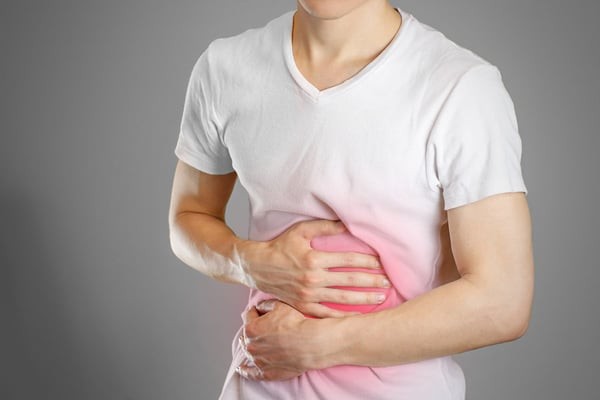 Đau bụng là một trong những tác dụng phụ của thuốc Diosmin